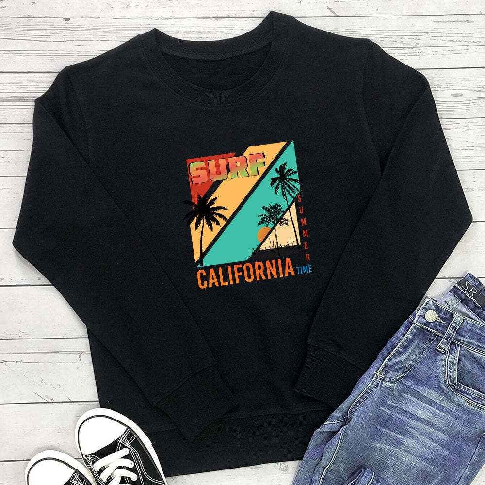 Sweat à capuche imprimé à motifs aux couleurs des fêtes