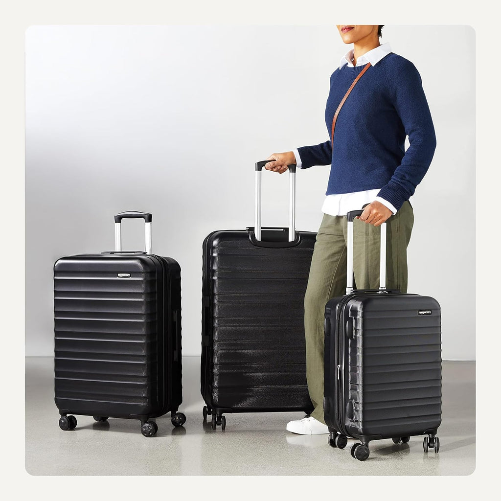 Amazon Basics 21" Hardside Carry-On Luggage with Spinner Wheels, Expandable for Up to 25% More Space, Scratch-Resistant Hard Shell, Telescoping Handle, Black