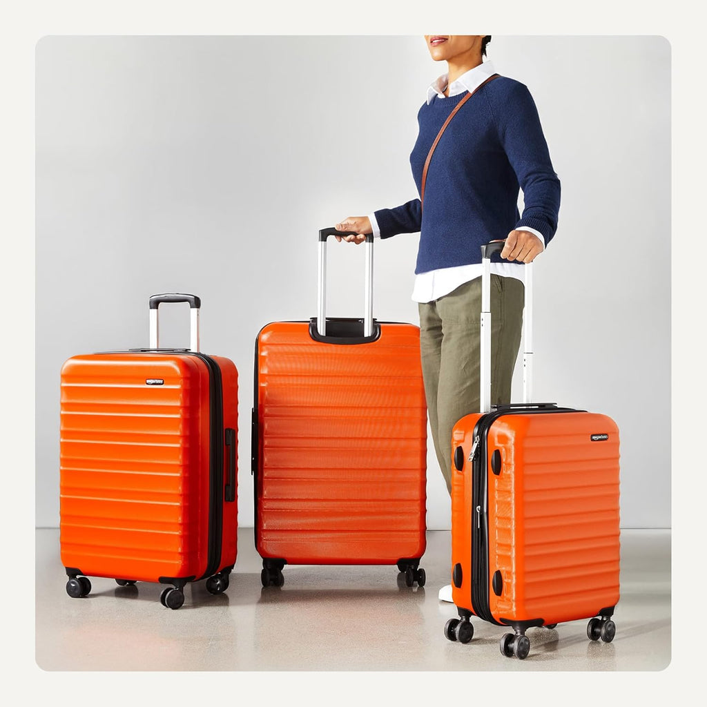 Amazon Basics 21" Hardside Carry-On Luggage with Spinner Wheels, Expandable for Up to 25% More Space, Scratch-Resistant Hard Shell, Telescoping Handle, Black