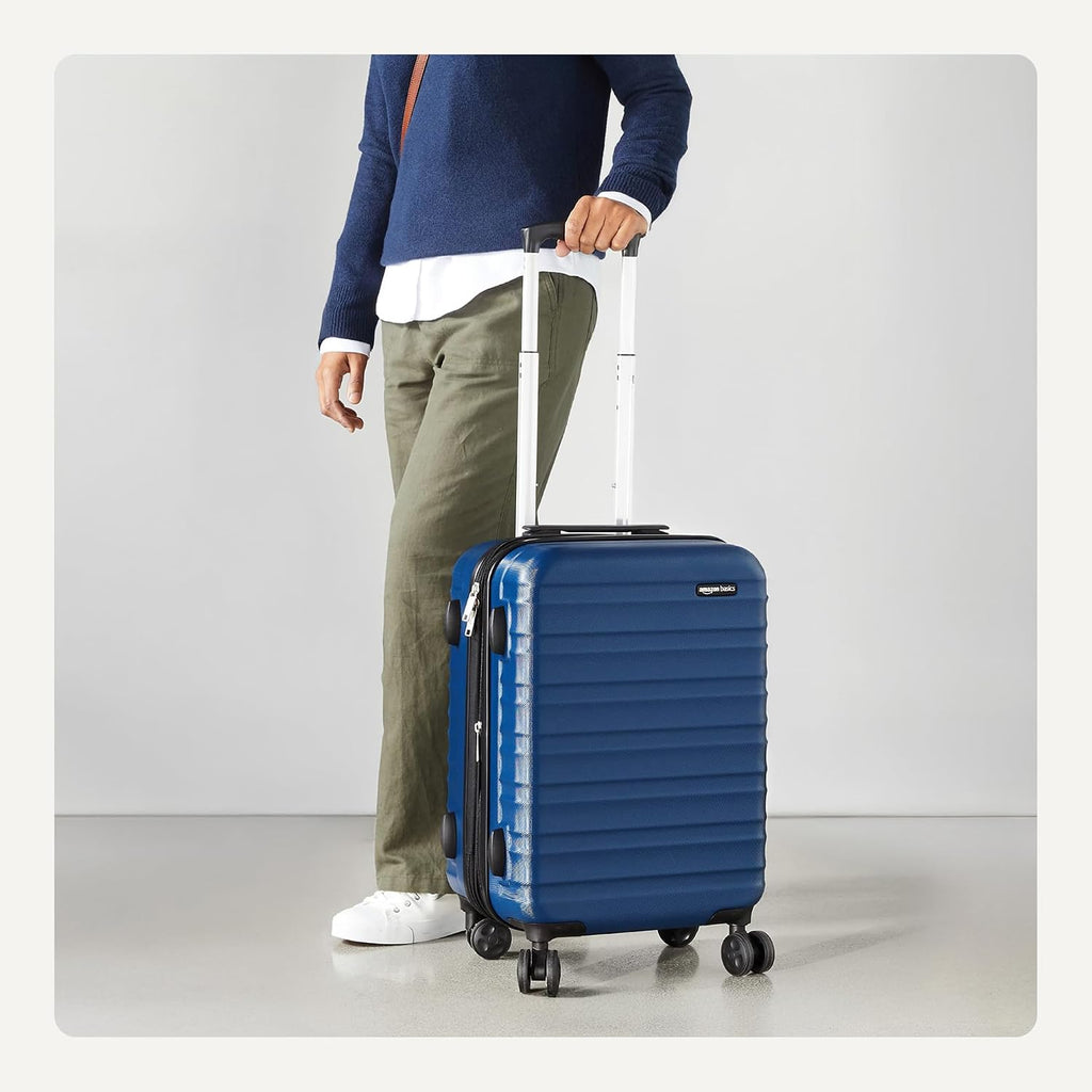 Amazon Basics 21" Hardside Carry-On Luggage with Spinner Wheels, Expandable for Up to 25% More Space, Scratch-Resistant Hard Shell, Telescoping Handle, Black