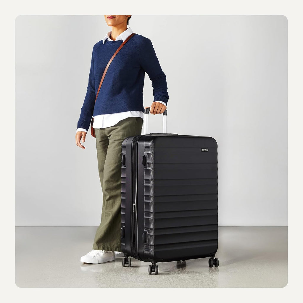 Amazon Basics 21" Hardside Carry-On Luggage with Spinner Wheels, Expandable for Up to 25% More Space, Scratch-Resistant Hard Shell, Telescoping Handle, Black