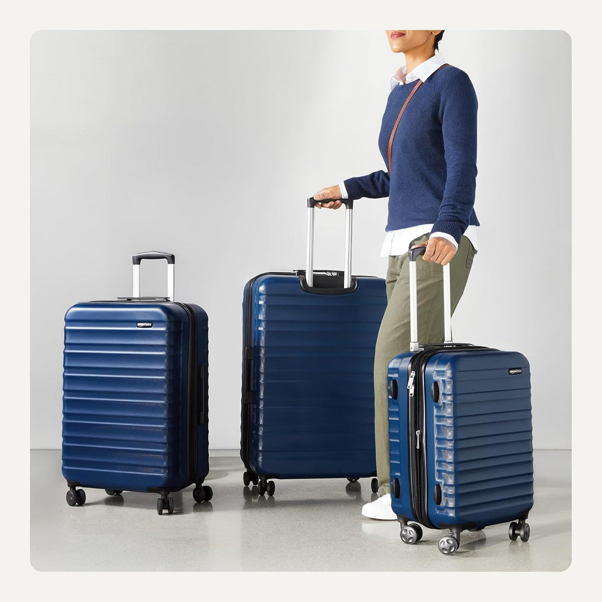 Amazon Basics 21" Hardside Carry-On Luggage with Spinner Wheels, Expandable for Up to 25% More Space, Scratch-Resistant Hard Shell, Telescoping Handle, Black