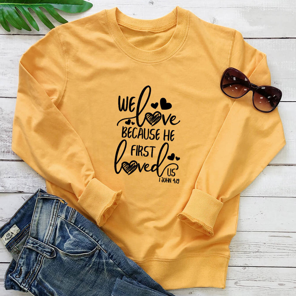 Bluza z kapturem z nadrukiem "Because He First Loved Us"