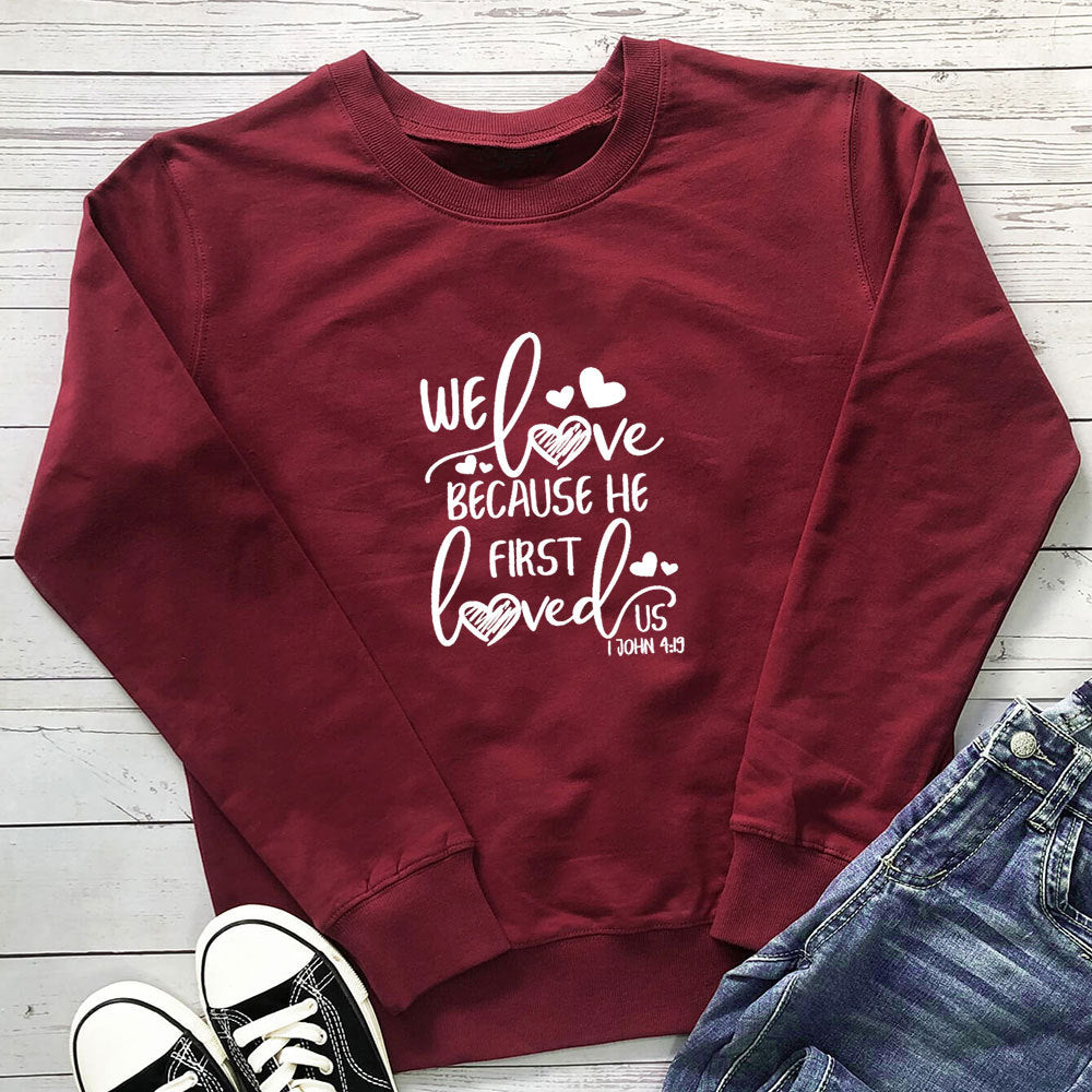 Bluza z kapturem z nadrukiem "Because He First Loved Us"