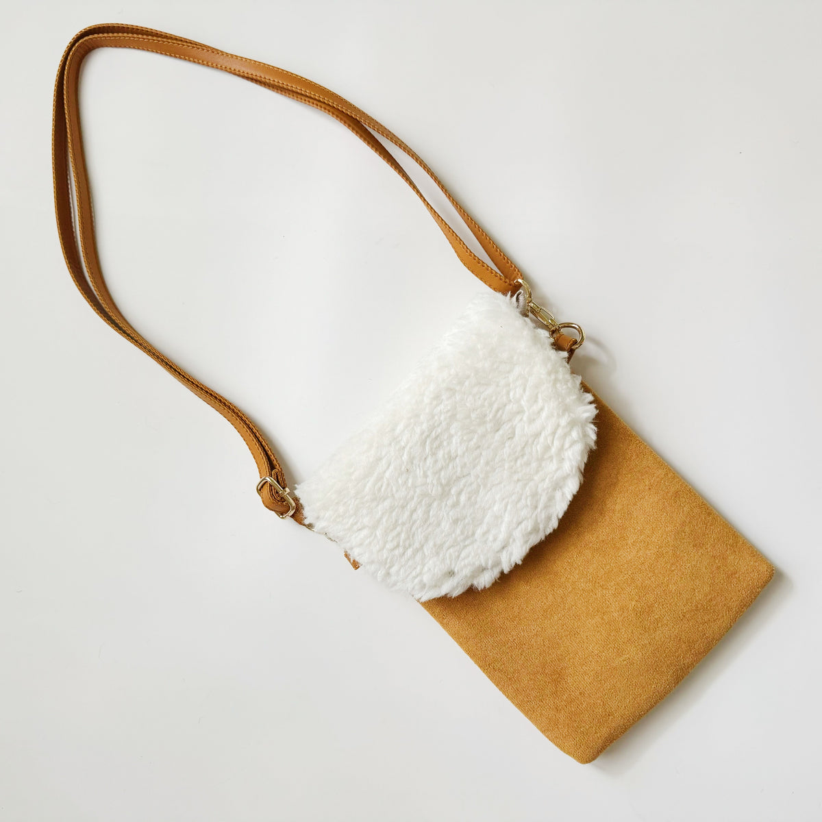 Poręczna torebka na telefon typu crossbody