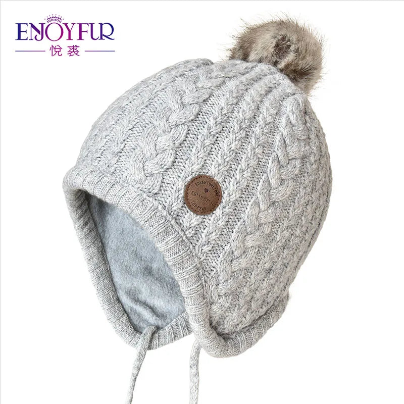 Gorro de punto de invierno ENJOYFUR para niños y niñas con pompón de piel de zorro natural, gorro cálido y grueso con orejeras para bebé