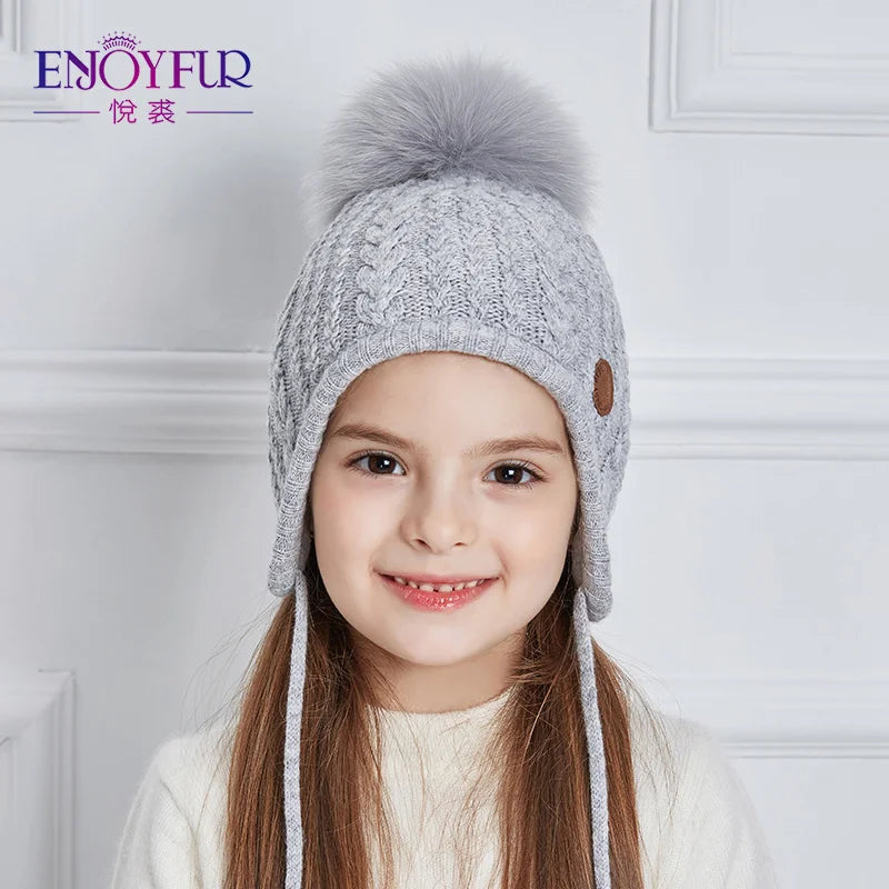Gorro de punto de invierno ENJOYFUR para niños y niñas con pompón de piel de zorro natural, gorro cálido y grueso con orejeras para bebé