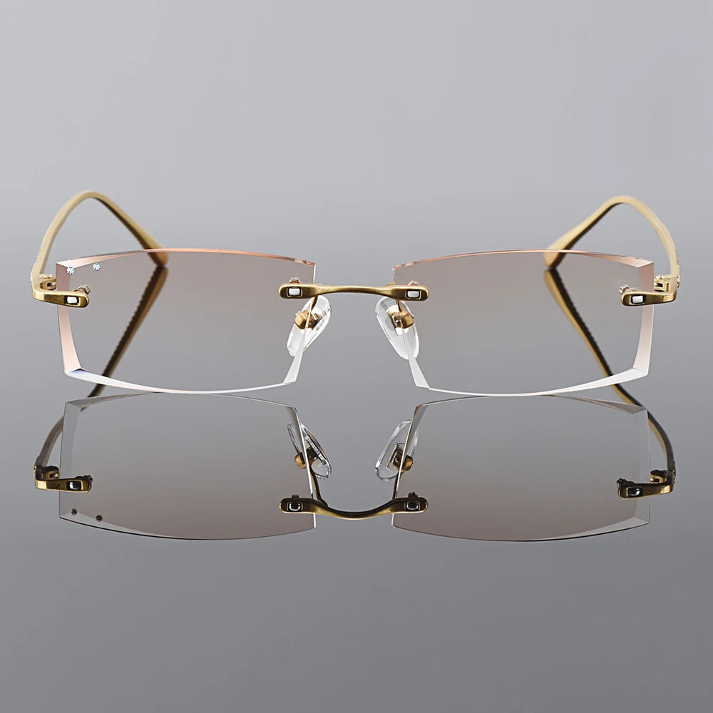 Oprawki okularowe męskie Gmei Optical prostokątne ze złotego stopu tytanu, bezramkowe z diamentowym szlifem, soczewki zerówki z gradientem brązowym Q6607