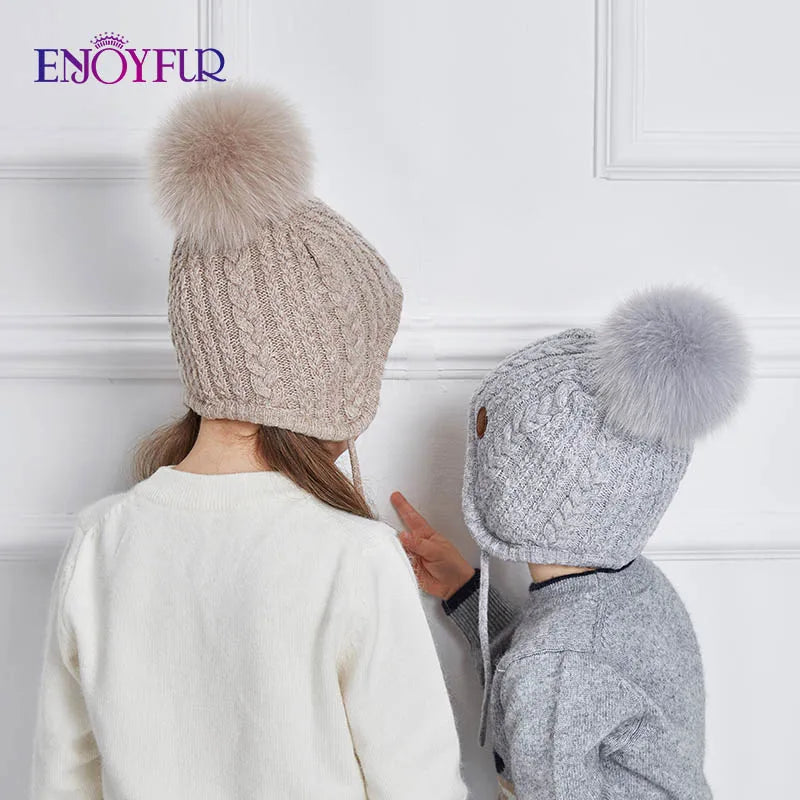 Gorro de punto de invierno ENJOYFUR para niños y niñas con pompón de piel de zorro natural, gorro cálido y grueso con orejeras para bebé