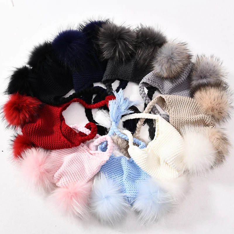 Gorro de punto con dos pompones de piel auténtica para bebés y niños, gorro de invierno con orejeras para niña y niño