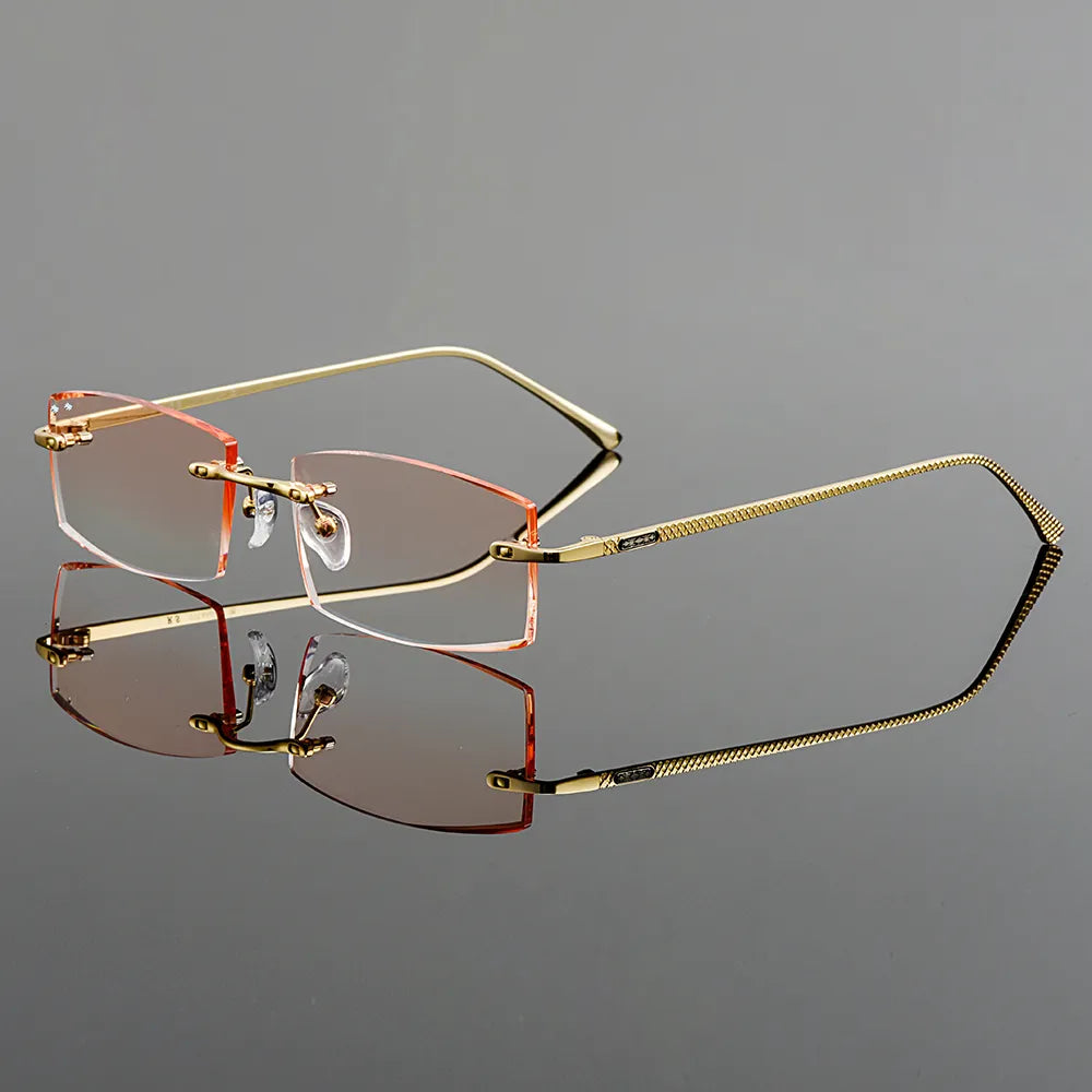 Oprawki okularowe męskie Gmei Optical prostokątne ze złotego stopu tytanu, bezramkowe z diamentowym szlifem, soczewki zerówki z gradientem brązowym Q6607