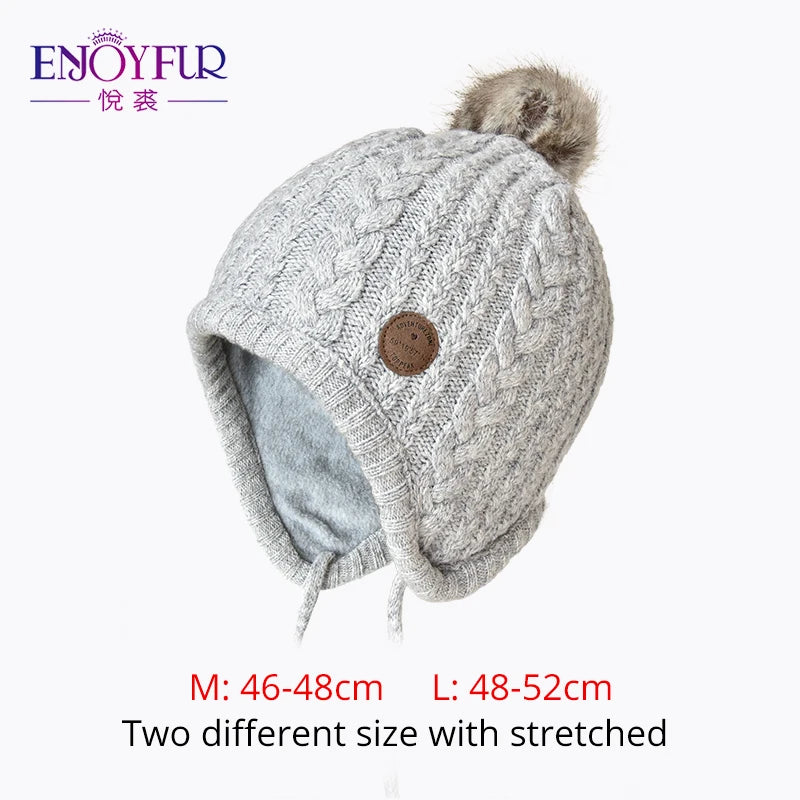Gorro de punto de invierno ENJOYFUR para niños y niñas con pompón de piel de zorro natural, gorro cálido y grueso con orejeras para bebé