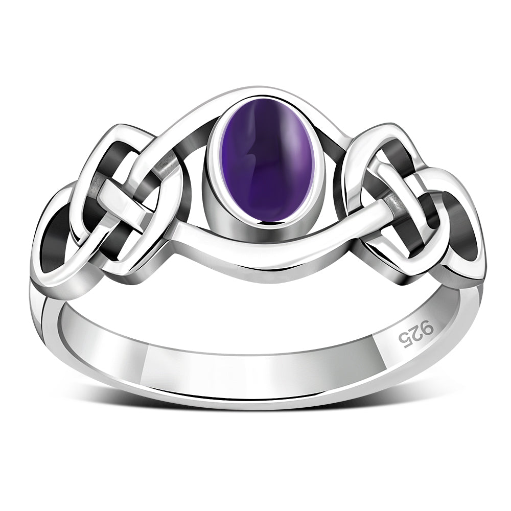 Anillo de plata con piedra amatista cabujón y nudo celta