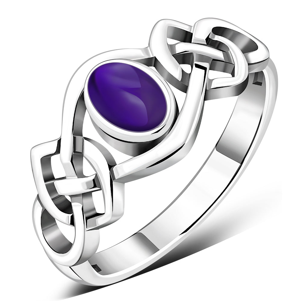 Anillo de plata con piedra amatista cabujón y nudo celta