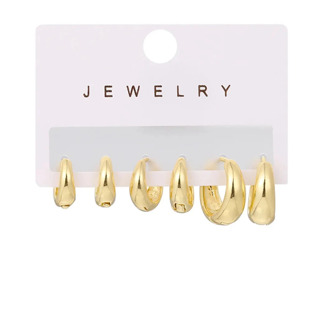 Pendientes de aro tipo huggie redondos minimalistas de acero inoxidable para mujer