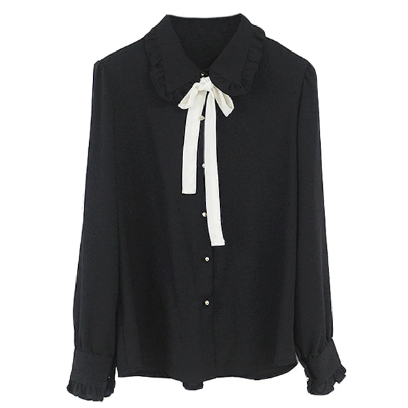Chiffonblus med rosett – preppy stil