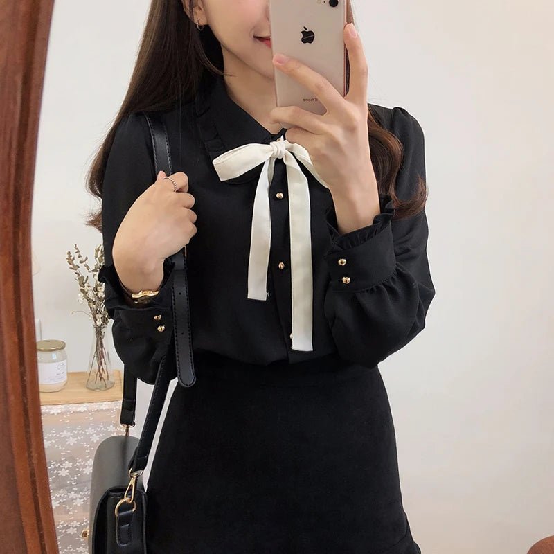 Chiffonblus med rosett – preppy stil