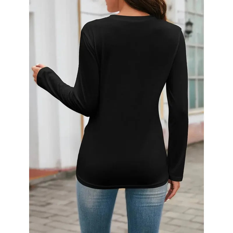 Women's casual long sleeveTShirt，Round collar design，Featuring a festive candy cane pattern print
