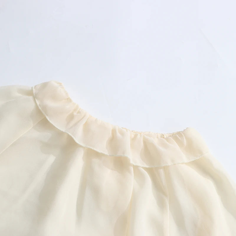Blusa holgada y transparente de algodón y poliéster para mujer de TWOTWINSTYLE