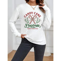 Women's casual long sleeveTShirt，Round collar design，Featuring a festive candy cane pattern print