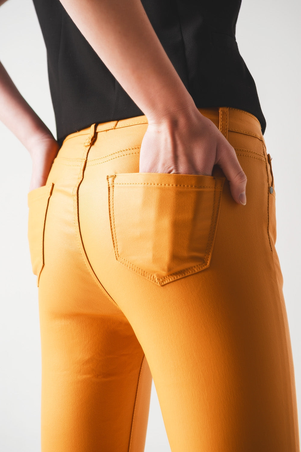 Belagda byxor i orange