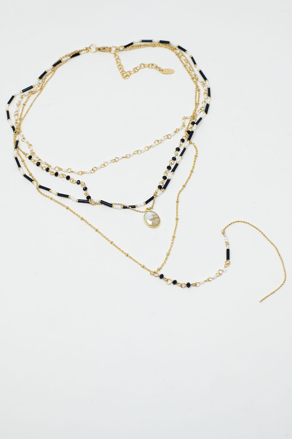 Gold 4 in 1 Necklace With Black and White Beads