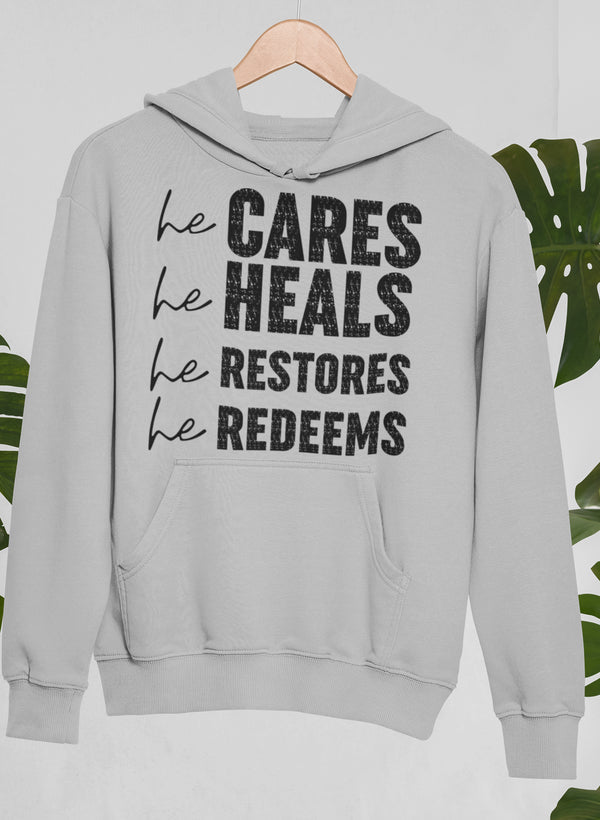 Sudadera Él cuida, Él sana, Él restaura, Él redime