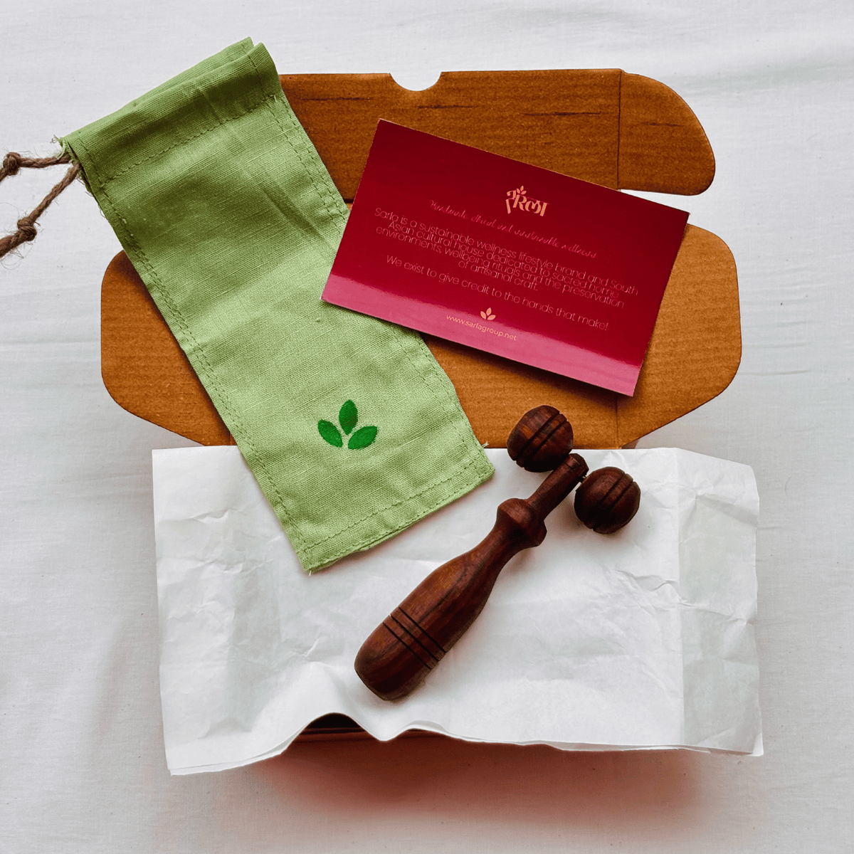 Rodillo de madera para masaje facial