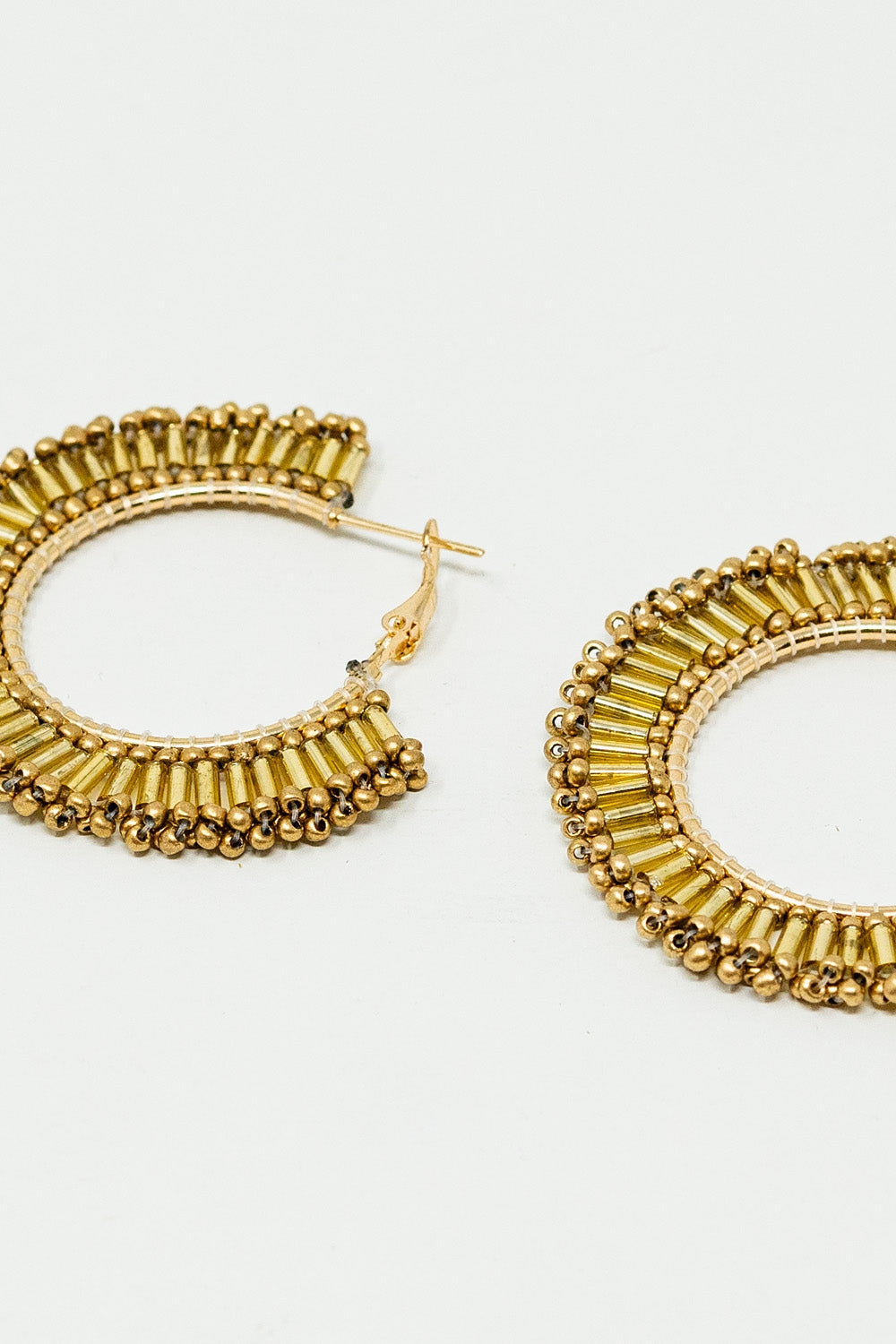 Medium Hoops With Beaded Details in Gold
