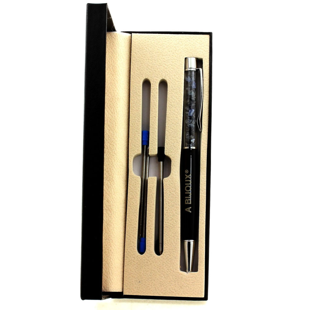 Raw Sapphire mineral pen Madagascar. Black color
