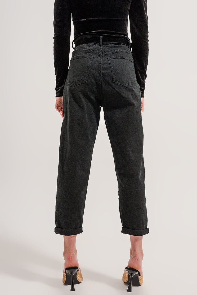 Jeans con detalle de bolsillos en negro