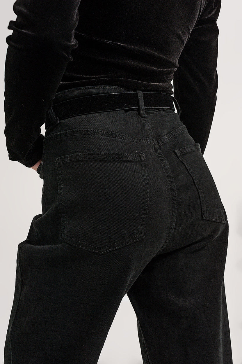 Jeans con detalle de bolsillos en negro