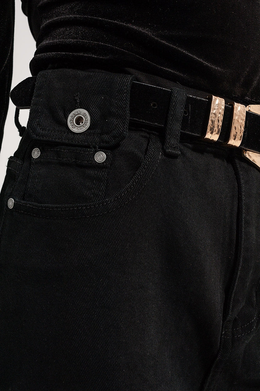 Jeans con detalle de bolsillos en negro