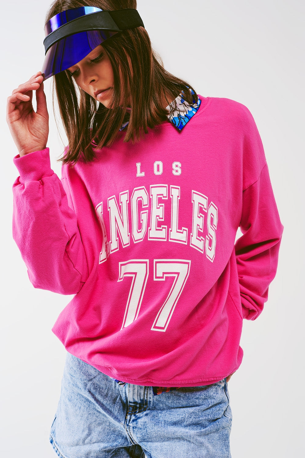 Sudadera con texto "Los Angeles 77" en color rosa
