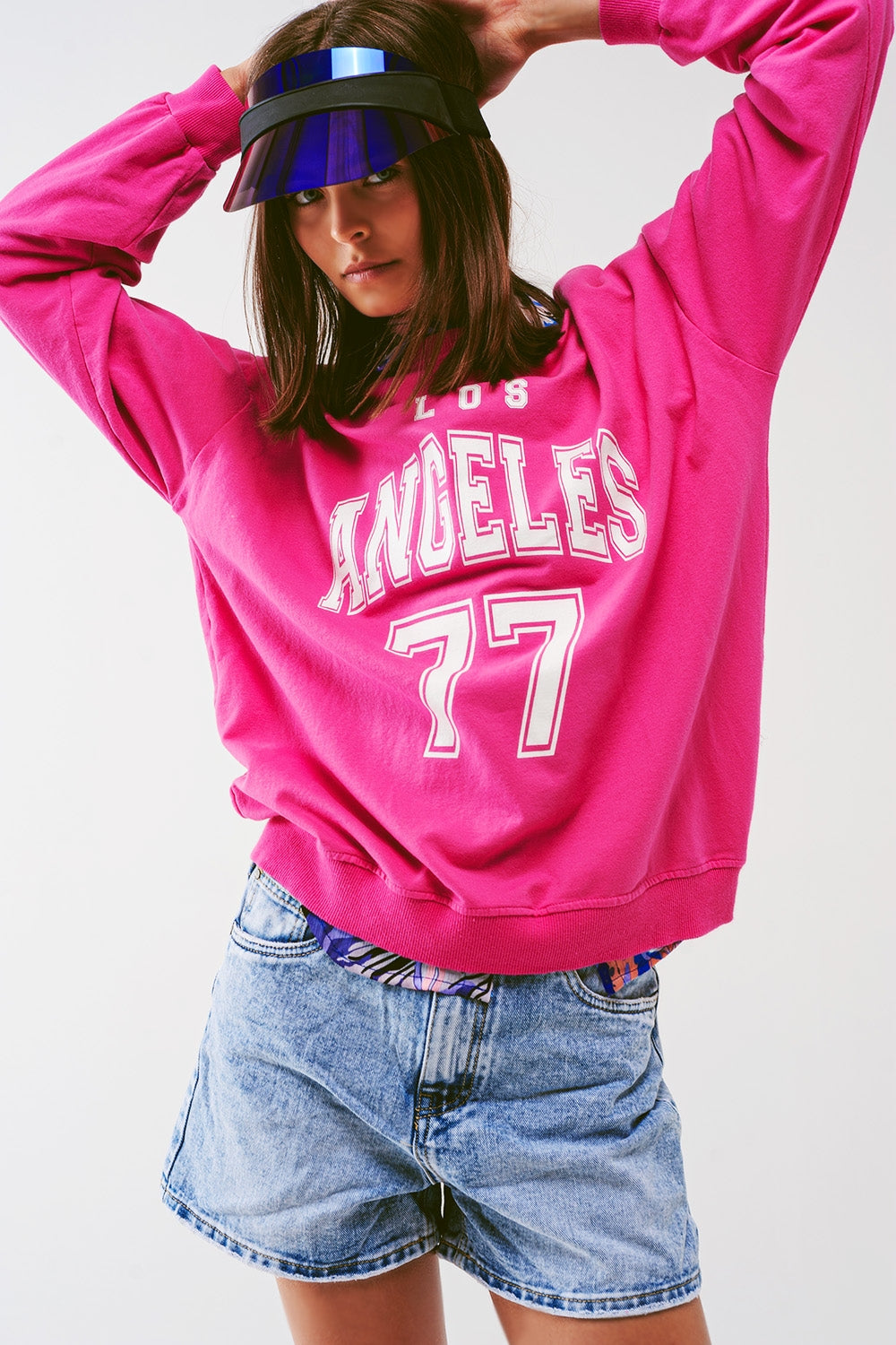 Sudadera con texto "Los Angeles 77" en color rosa